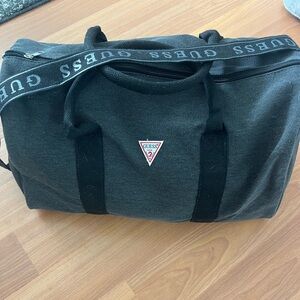 SOLD.    Guess duffle. NWT. Perfect condition.